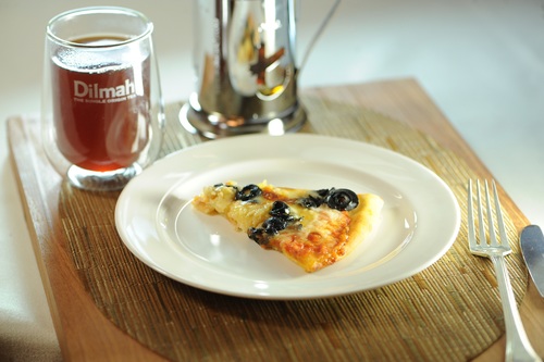 Four Cheese Pizza with Black Olives Paired with Ceylon Spice Chai