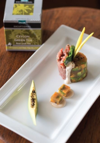 Tuna Tartar Layered With Jellied Green Tea With Avocado And Fresh Mango Dressed With Fried Cinnamon And Black Pepper