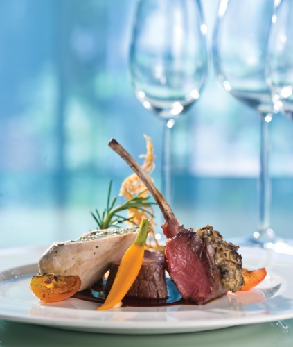 Mustard and Oats Crusted Lamb Loin Served with Asian Spiced Chicken, Dilmah Almond Tea Infused Heart of Beef, Ratatouille and Mild Dilmah Mint Tea Glaze