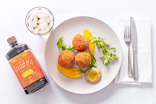 Beetroot, Goat Cheese and Peach tea with Arancini